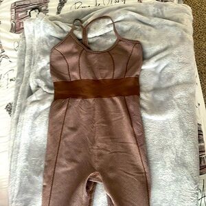 a brown jumpsuit from fashion nova